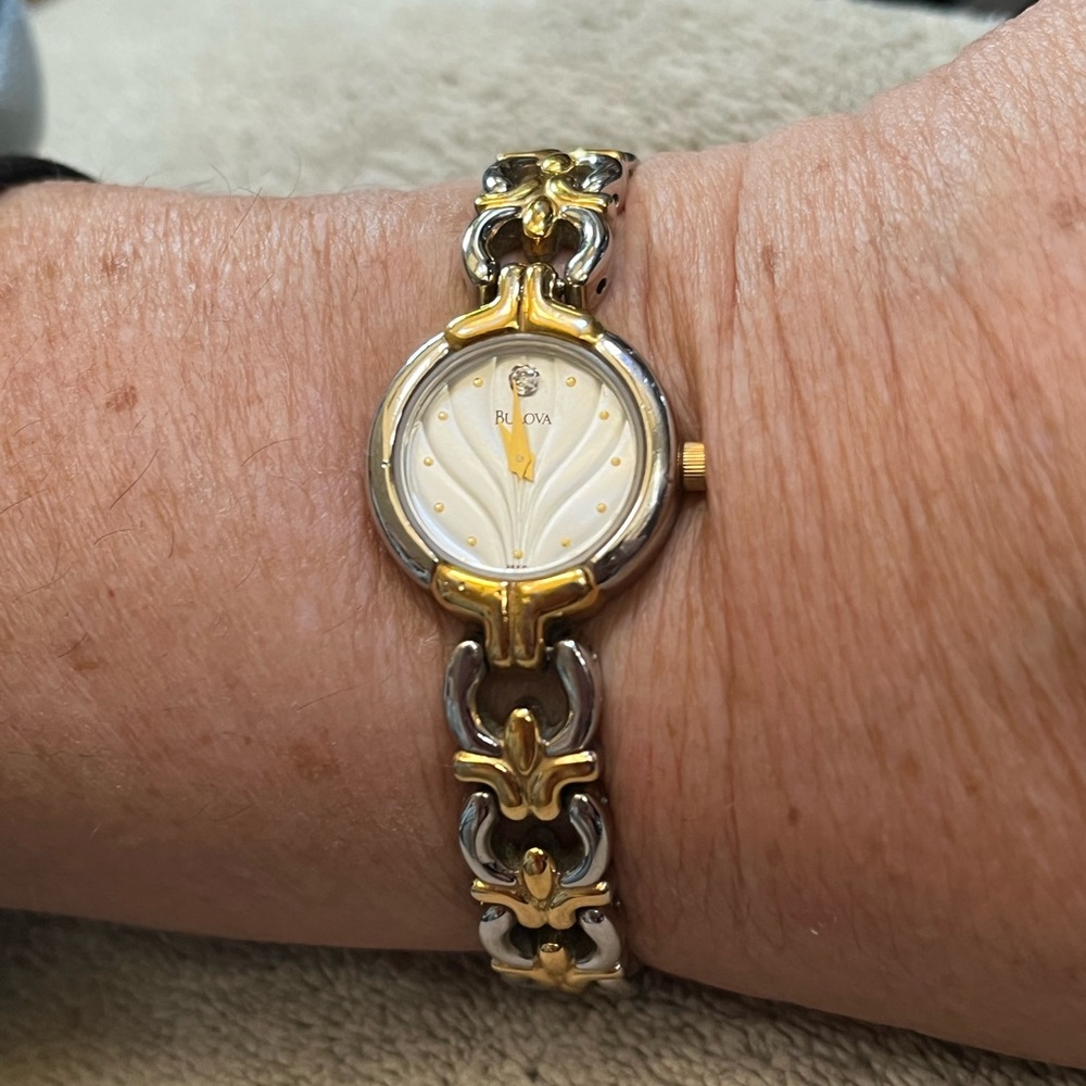 Bulova watch. Diamond on face. Dual tone. Lightly used… great condition.